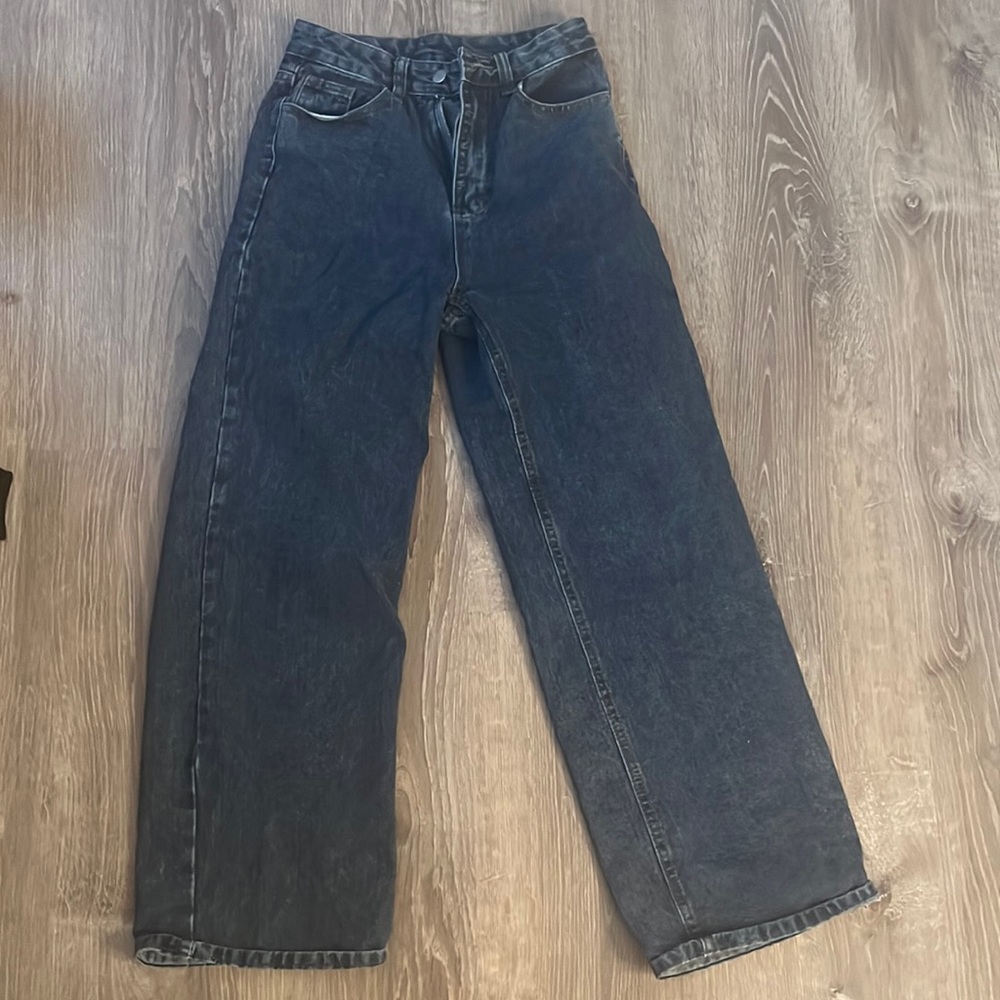 Woman’s baggy jeans